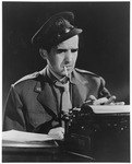 Edward R. Murrow working on a report for "This is London,", 1943