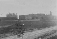 View of Tufts campus and construction of Barnum Hall, 1883 -- 1884
