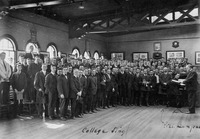 A college sing led by Leo Lewis, 1915